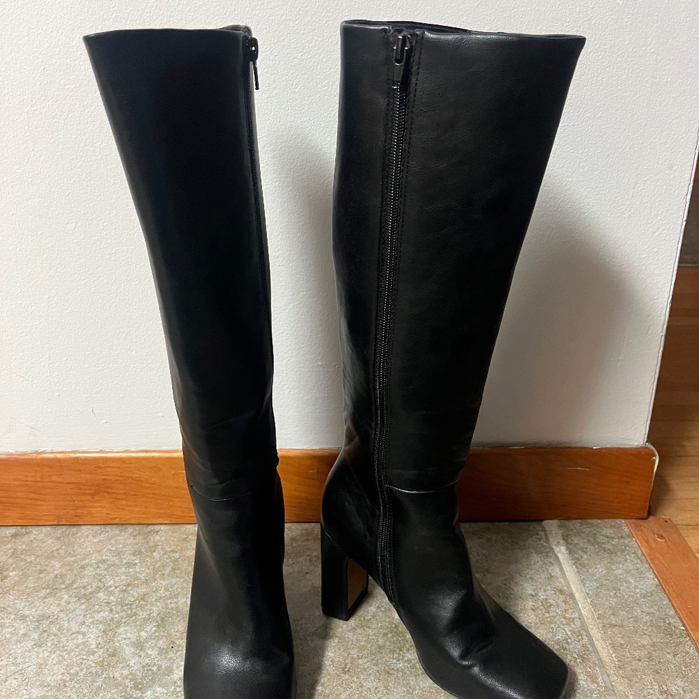 High Heeled high boots